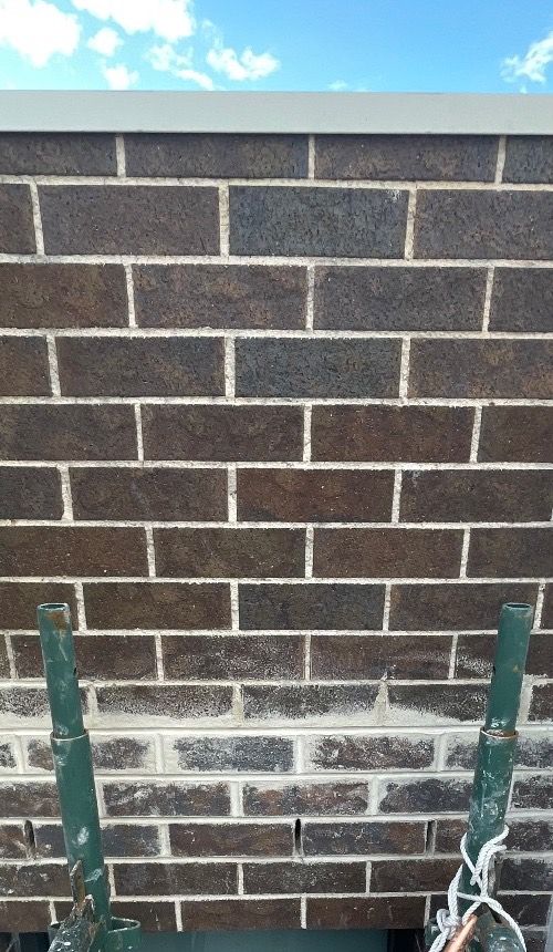 Face brick wall, before