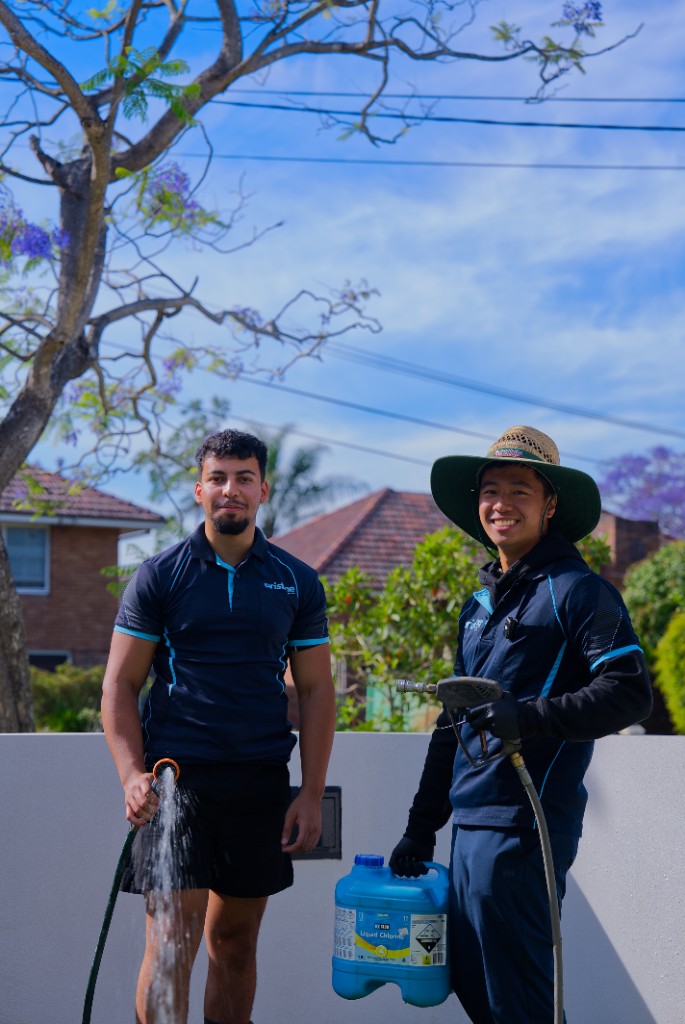 Pristine Pressure Clean technicians with professional equipment