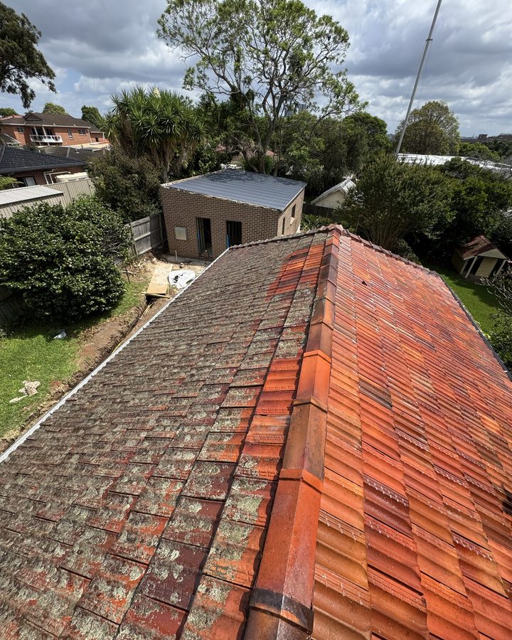 Half-washed tile roof in Concord